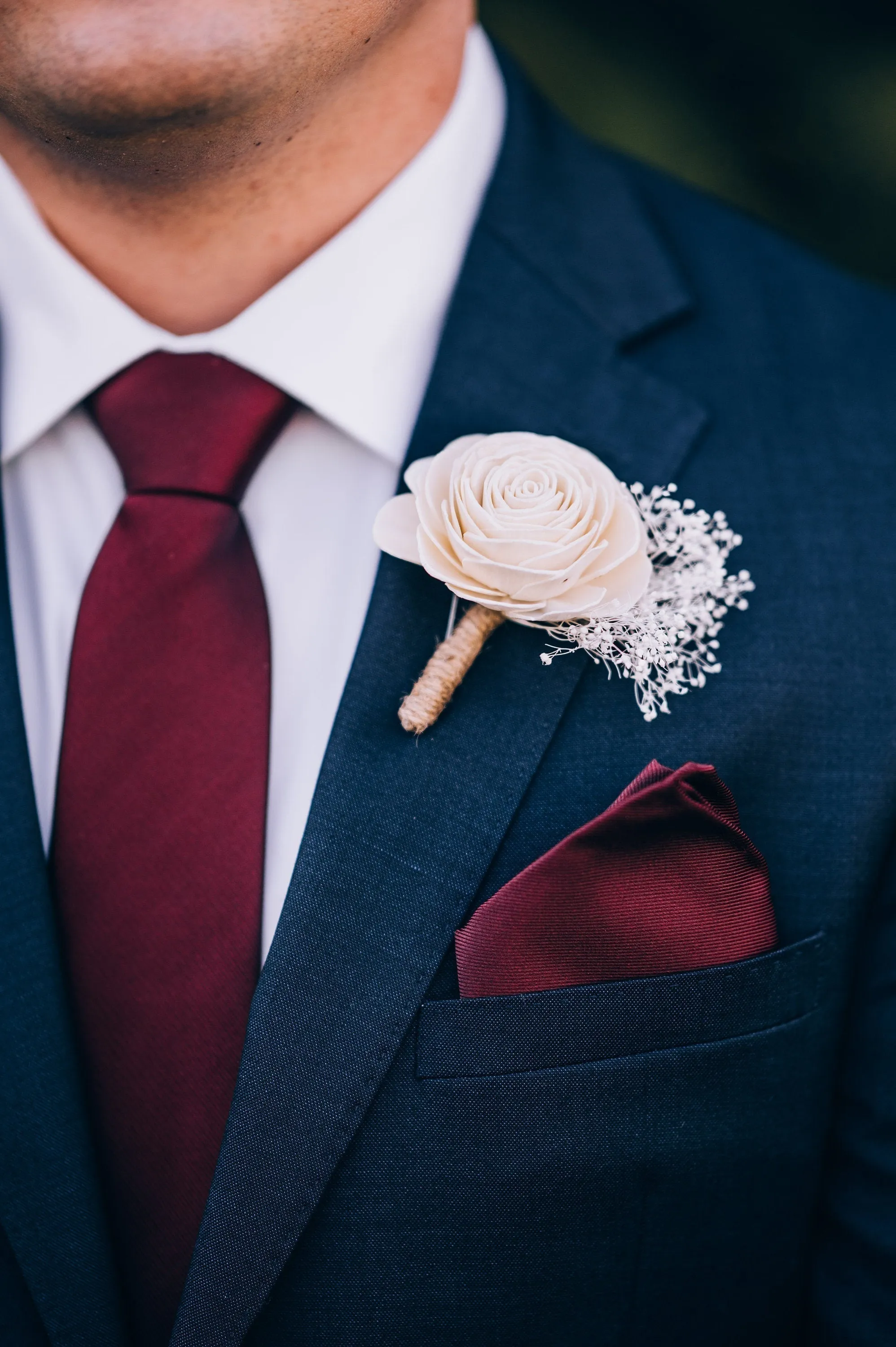 Boutonniere with All Ivory Roses and Baby's Breath Filler