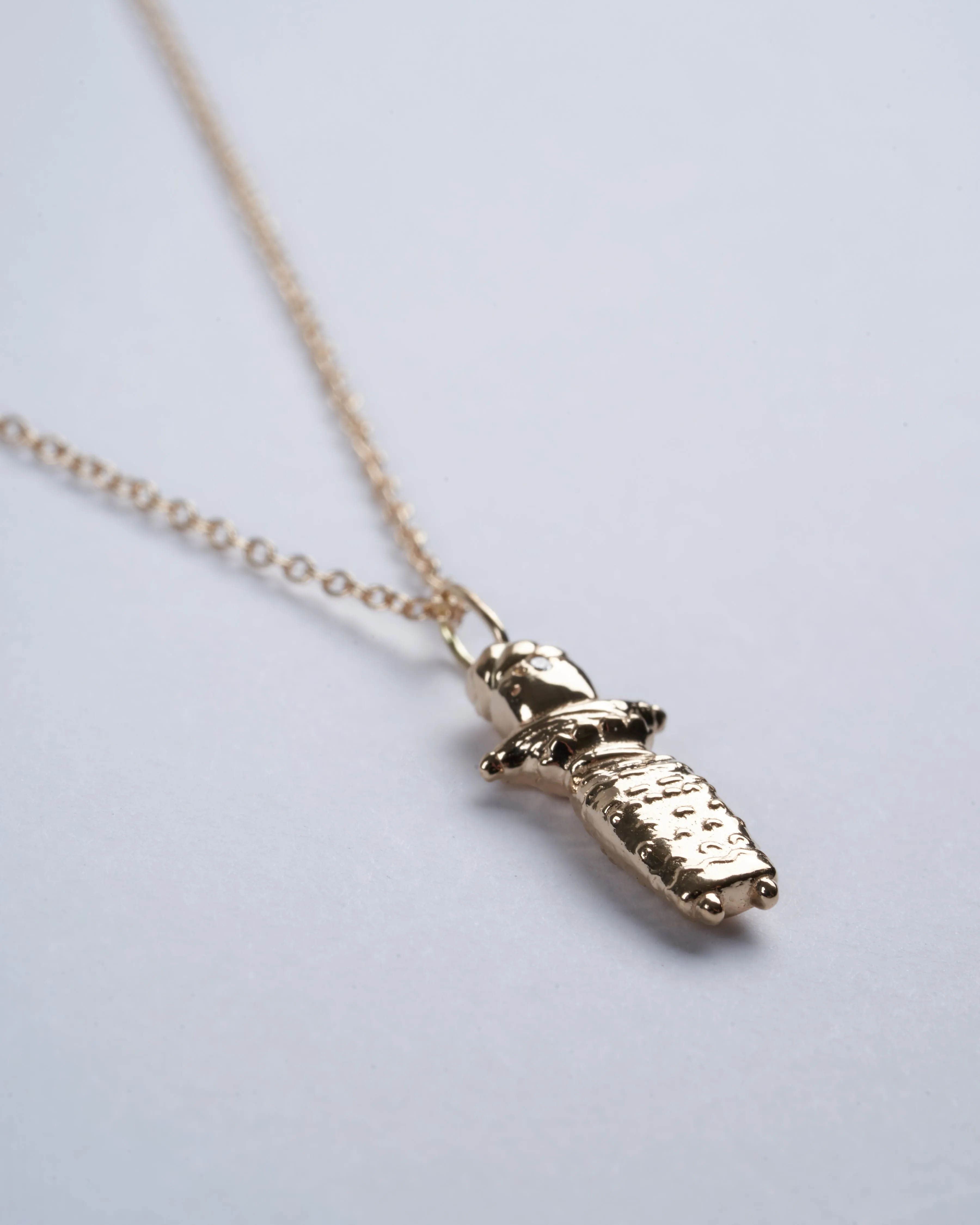 iq worry doll 14k yg w/ 16" chain - 14k gold