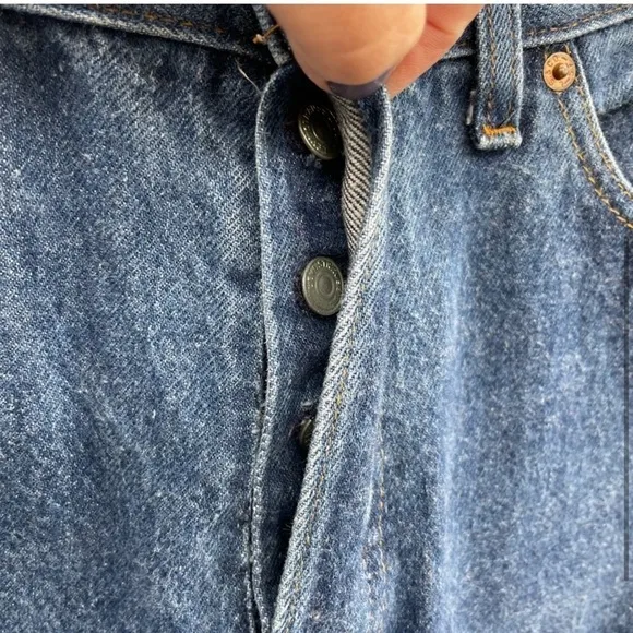 Levi’s vintage straight leg high rise blue woman’s  button-fly jean.  31