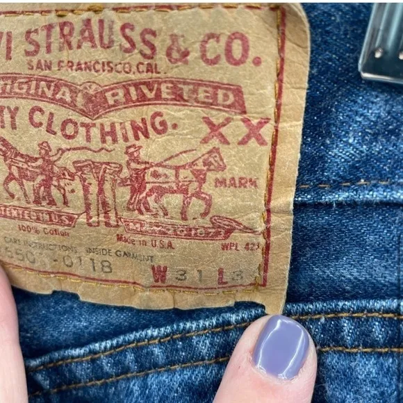 Levi’s vintage straight leg high rise blue woman’s  button-fly jean.  31