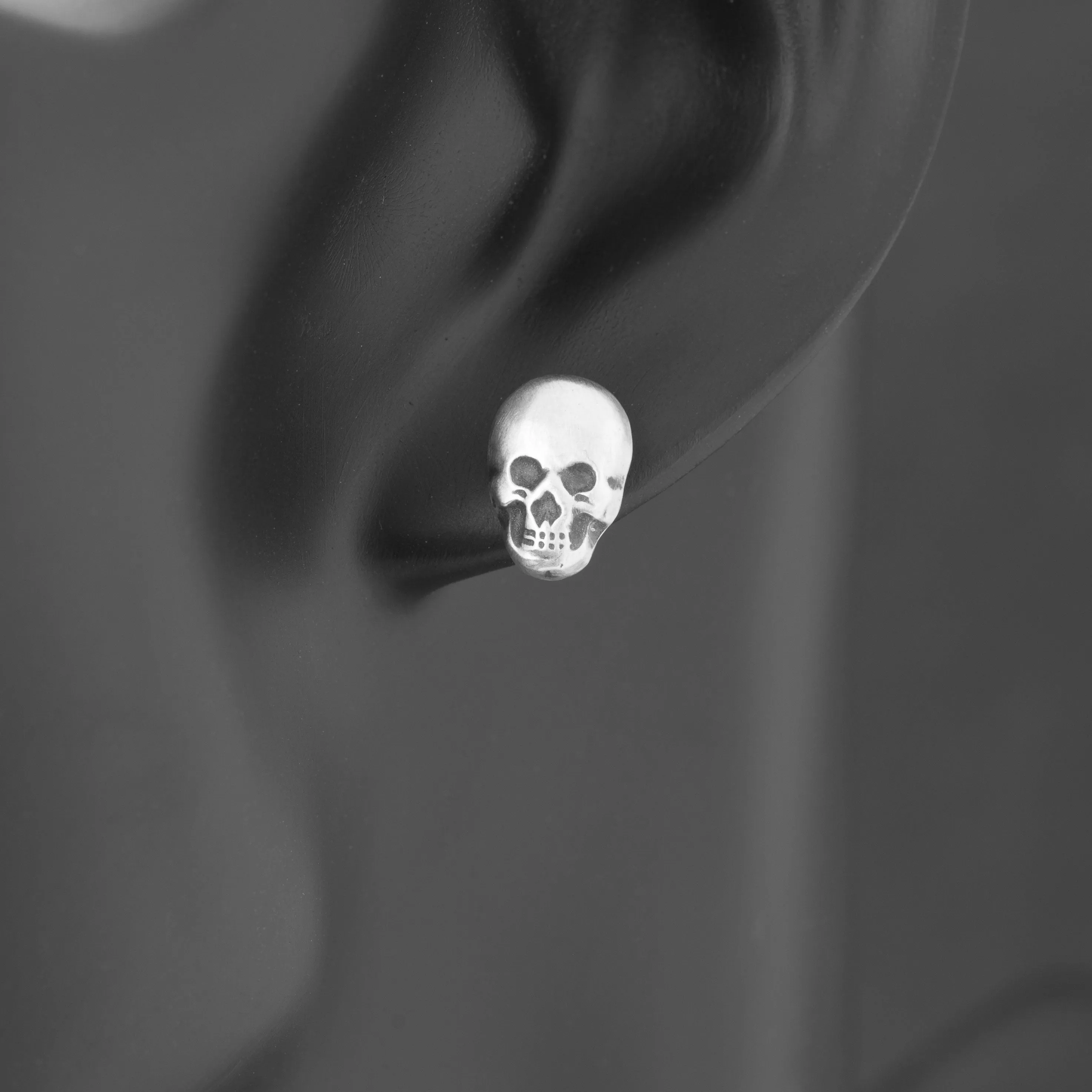 Silver Grinning Skull Stud Earrings